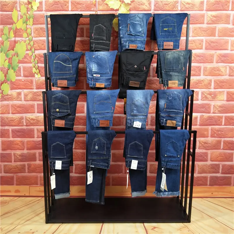 Manufacturer follows orders with remaining trendy jeans in stock